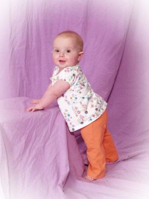 kivrin-standing-in-orange-pants