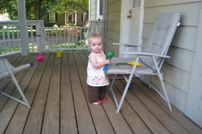 kivrin playing on the porch