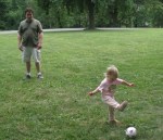kivrin and dada kicking the&nbsp;ball2